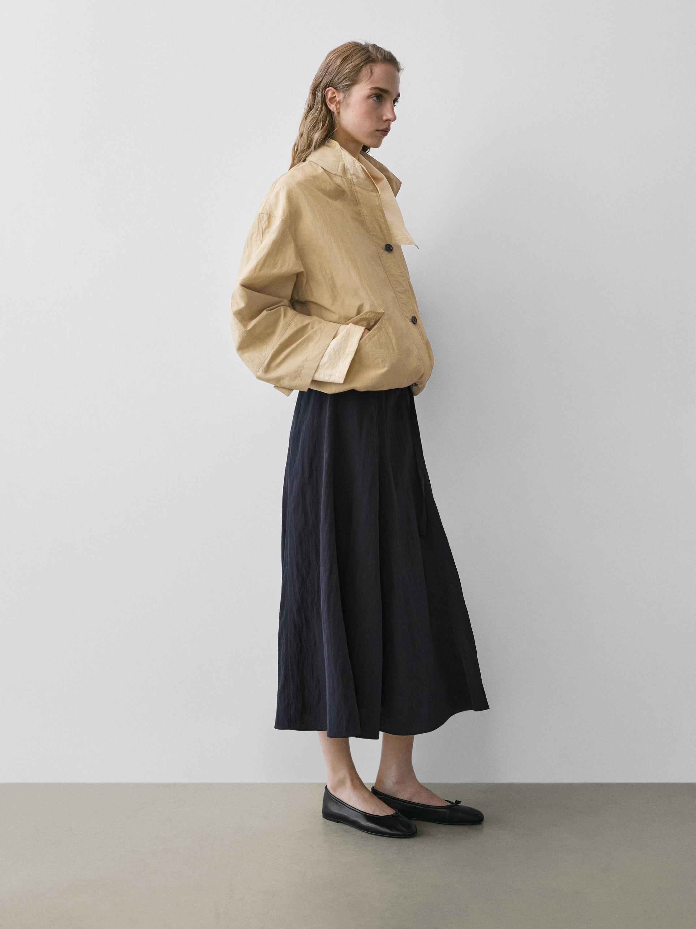 Long skirt with belt detail